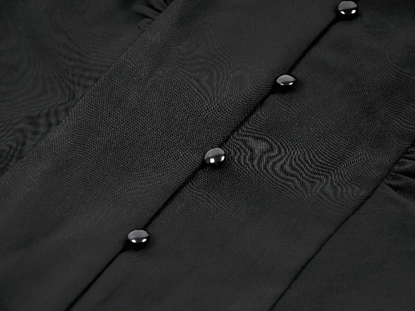 Gothic Black Ruffled Blouse with Corset Lace Back featuring elegant black buttons and soft fabric texture.