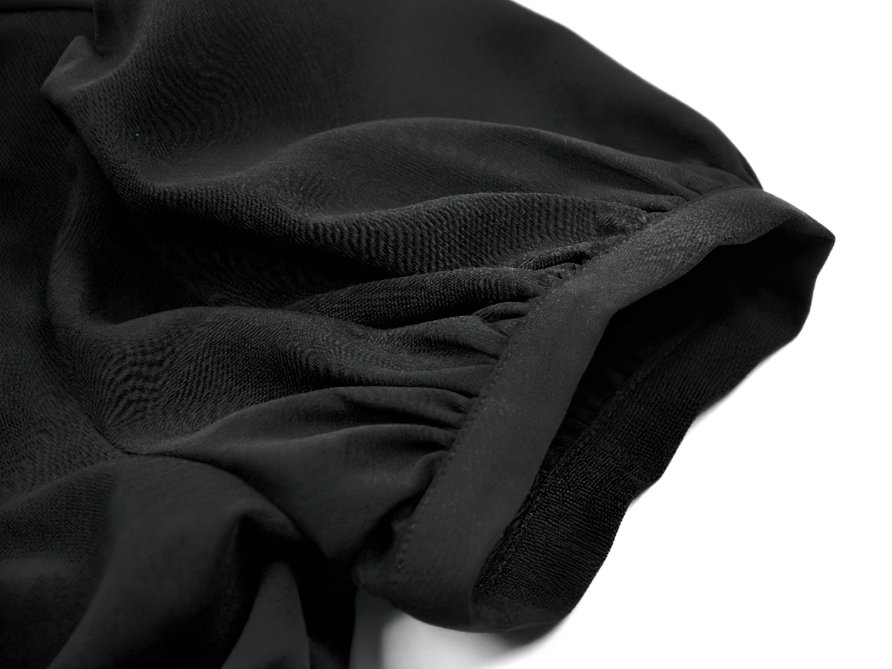 Gothic Black Ruffled Blouse with Corset Lace Back puff sleeve detail showcasing elegant ruffle design.