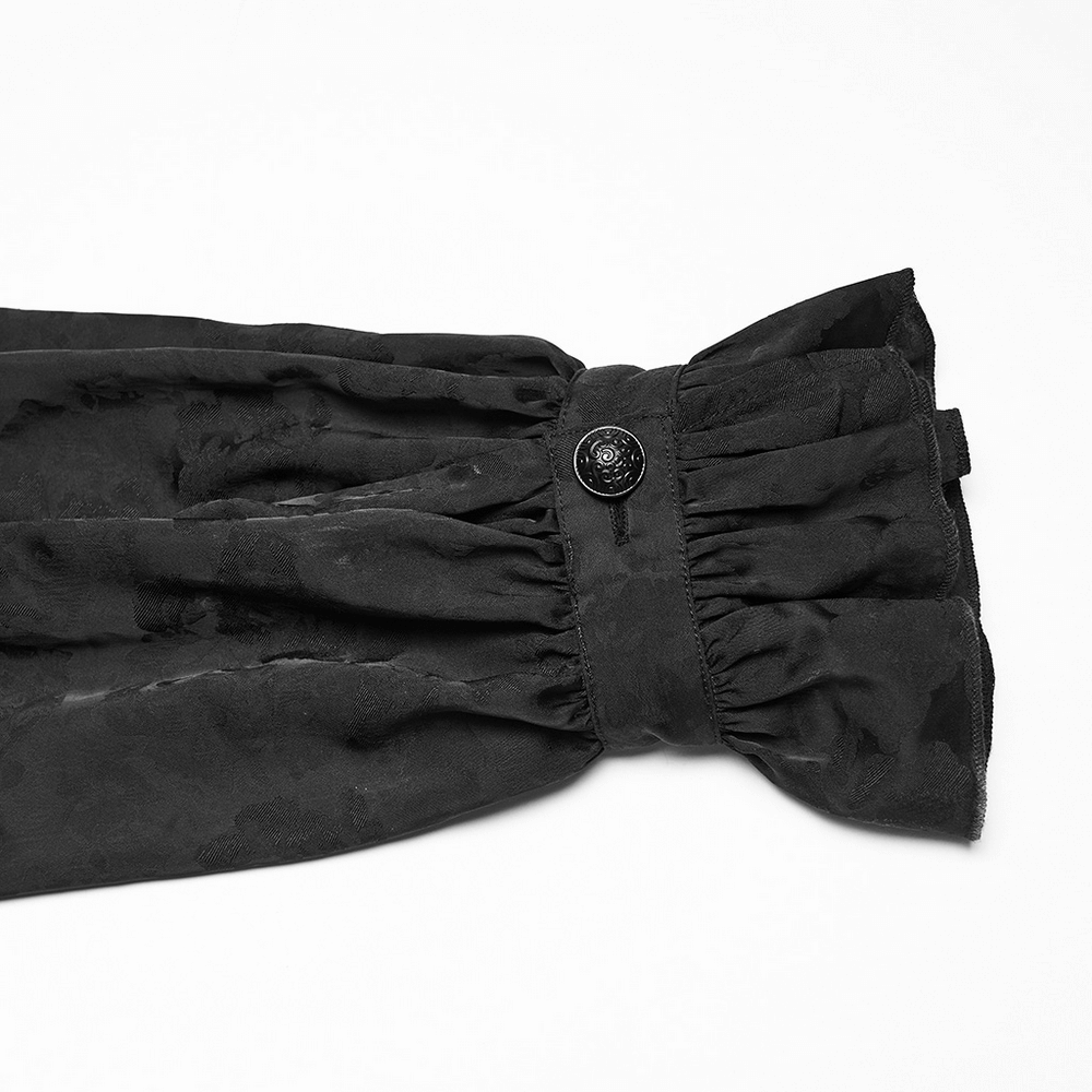 Gothic Black Ruffled Collar Embroidered Long Sleeve Shirt detail featuring a ruffled sleeve with a button.