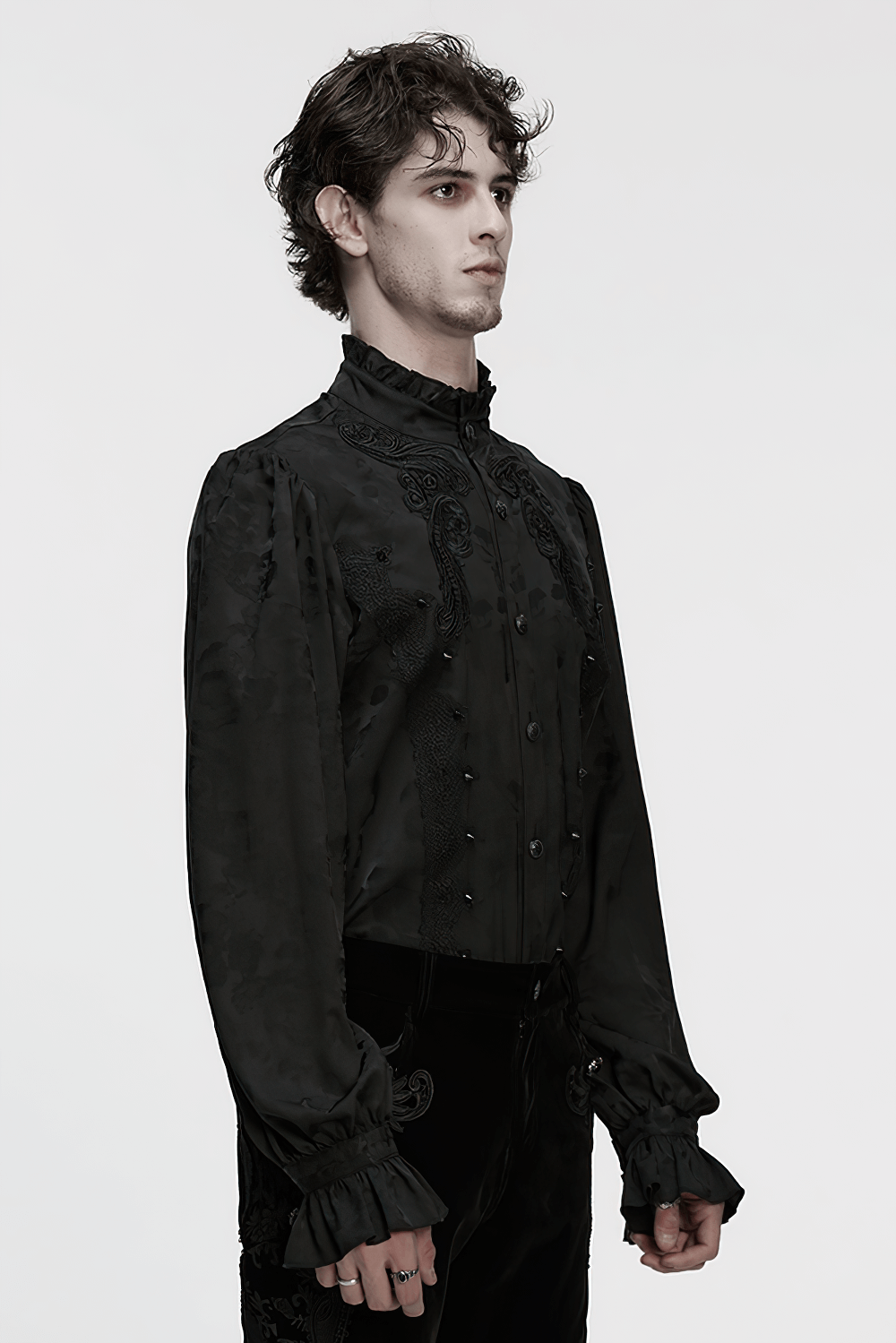 Gothic Black Ruffled Collar Embroidered Long Sleeve Shirt showcased in a dramatic style with lace and ruffled edges.