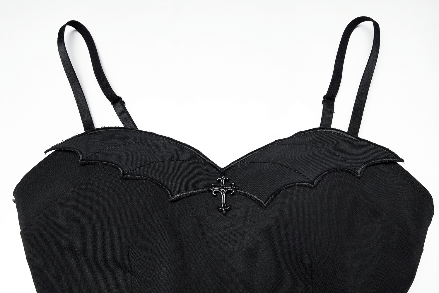 Close-up of the Gothic Black Scalloped dress bodice with bat-wing design and decorative cross detail.