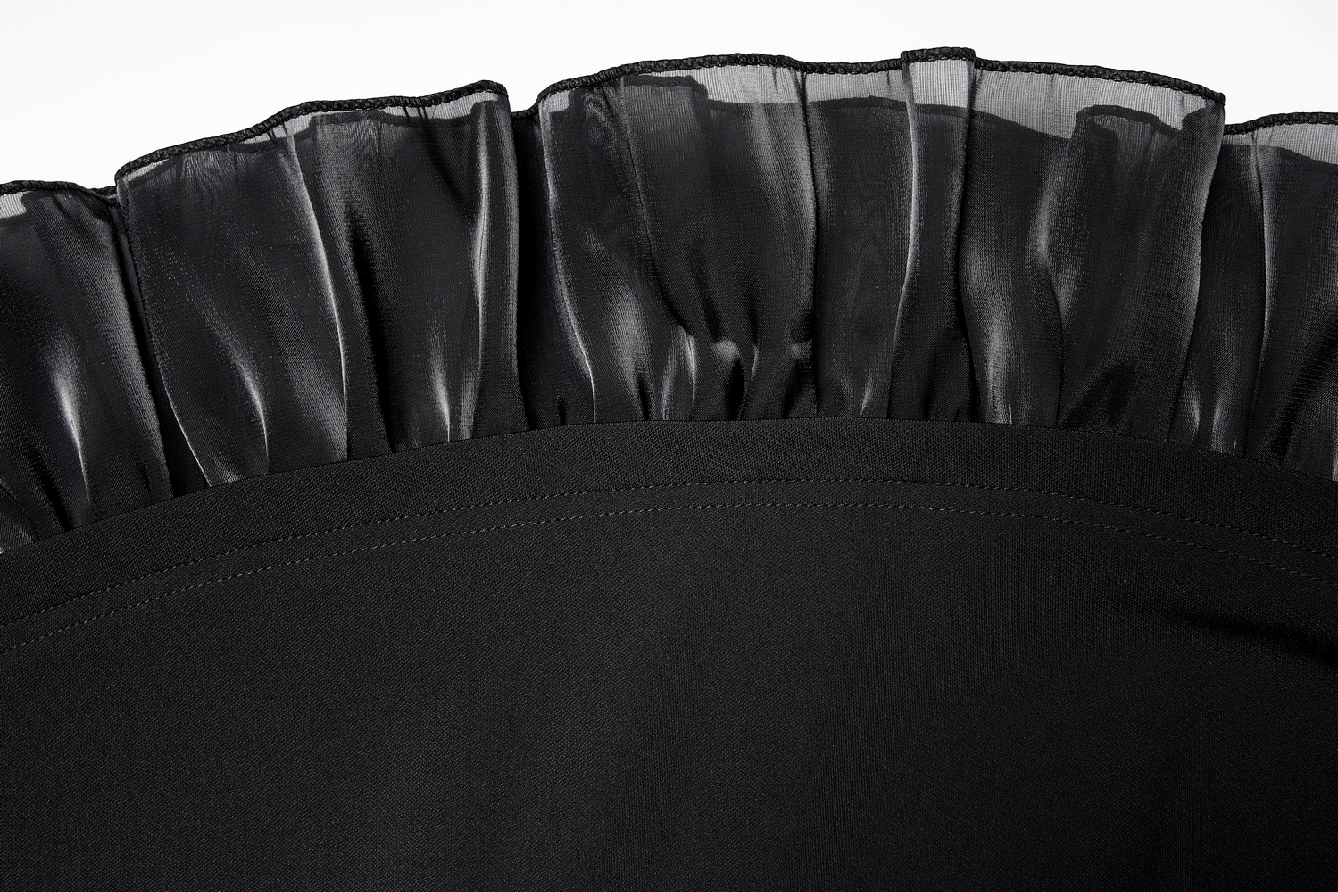 Close-up of the black scalloped hem lace detailing on a Gothic skater dress, showcasing elegance in design.