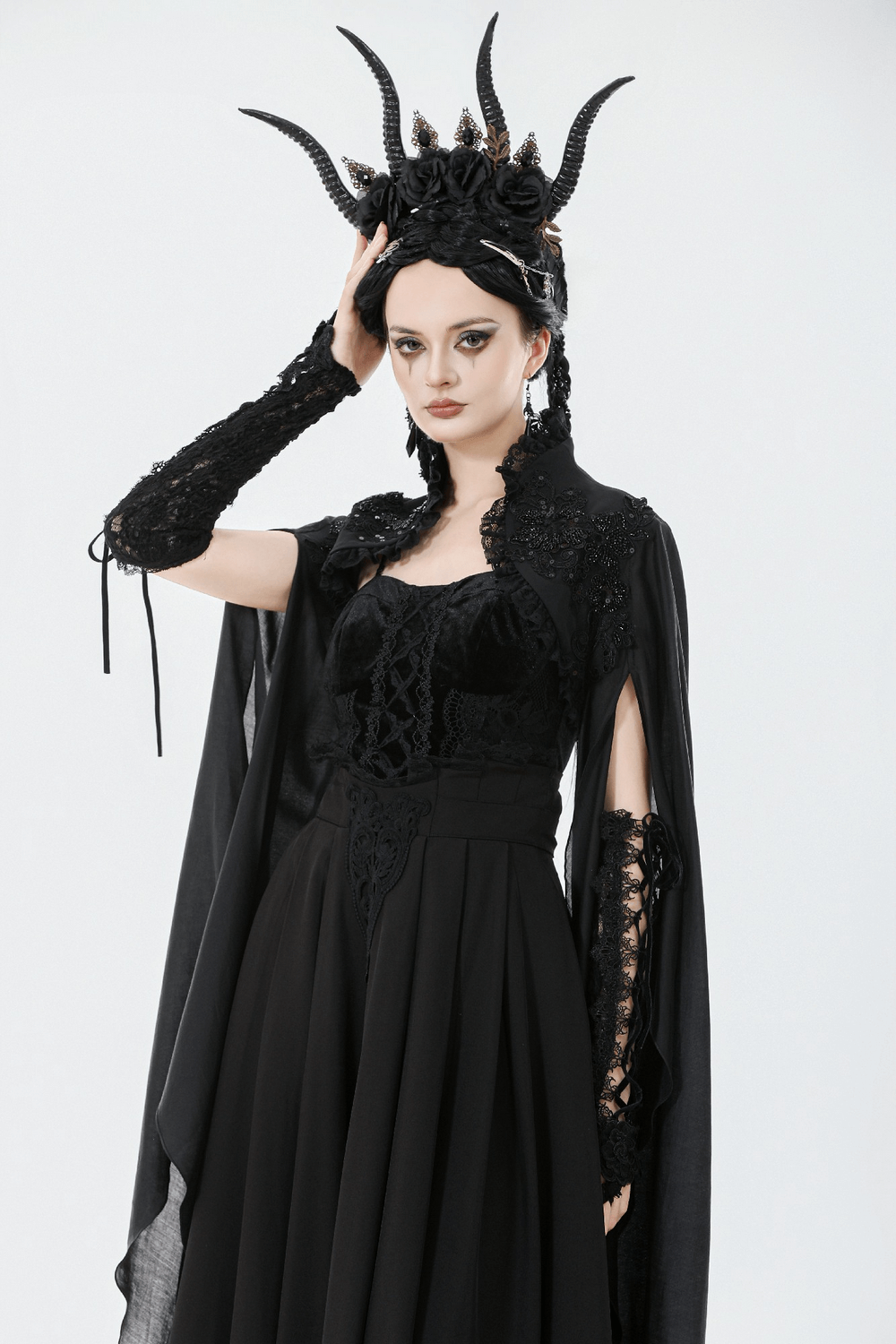 Gothic Black Shrug with Beaded Embroidery and Long Sleeves styled with a dramatic black gown and intricate headpiece.