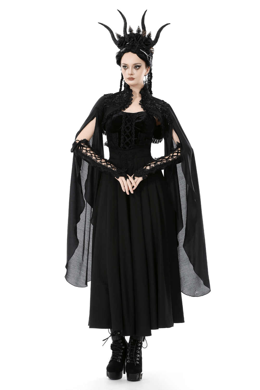 Gothic Black Shrug with Beaded Embroidery and Long Sleeves worn over a dramatic black dress and styled with gothic accessories.