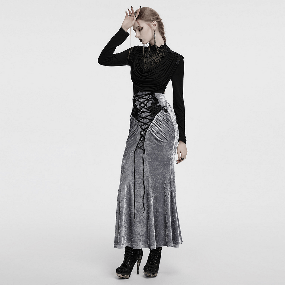 Gothic black long sleeve top with collar styled with a grey velvet skirt, perfect for a dramatic, elegant look.