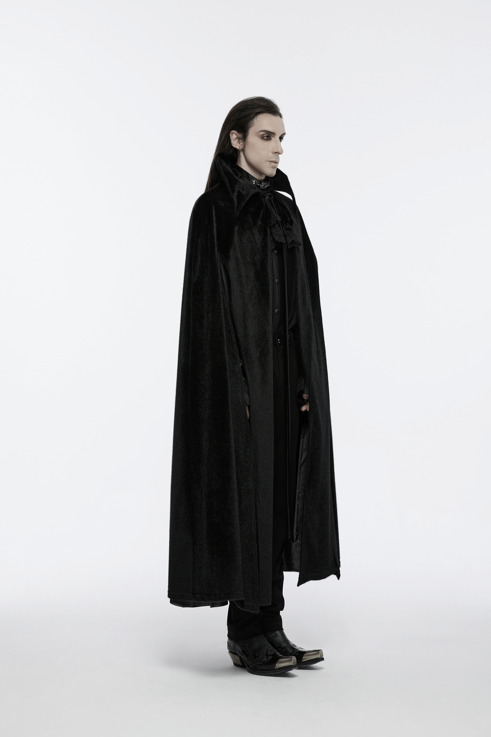 Gothic black vampire cape with 3D bat collar worn by a man, showcasing elegant design and dramatic flair.