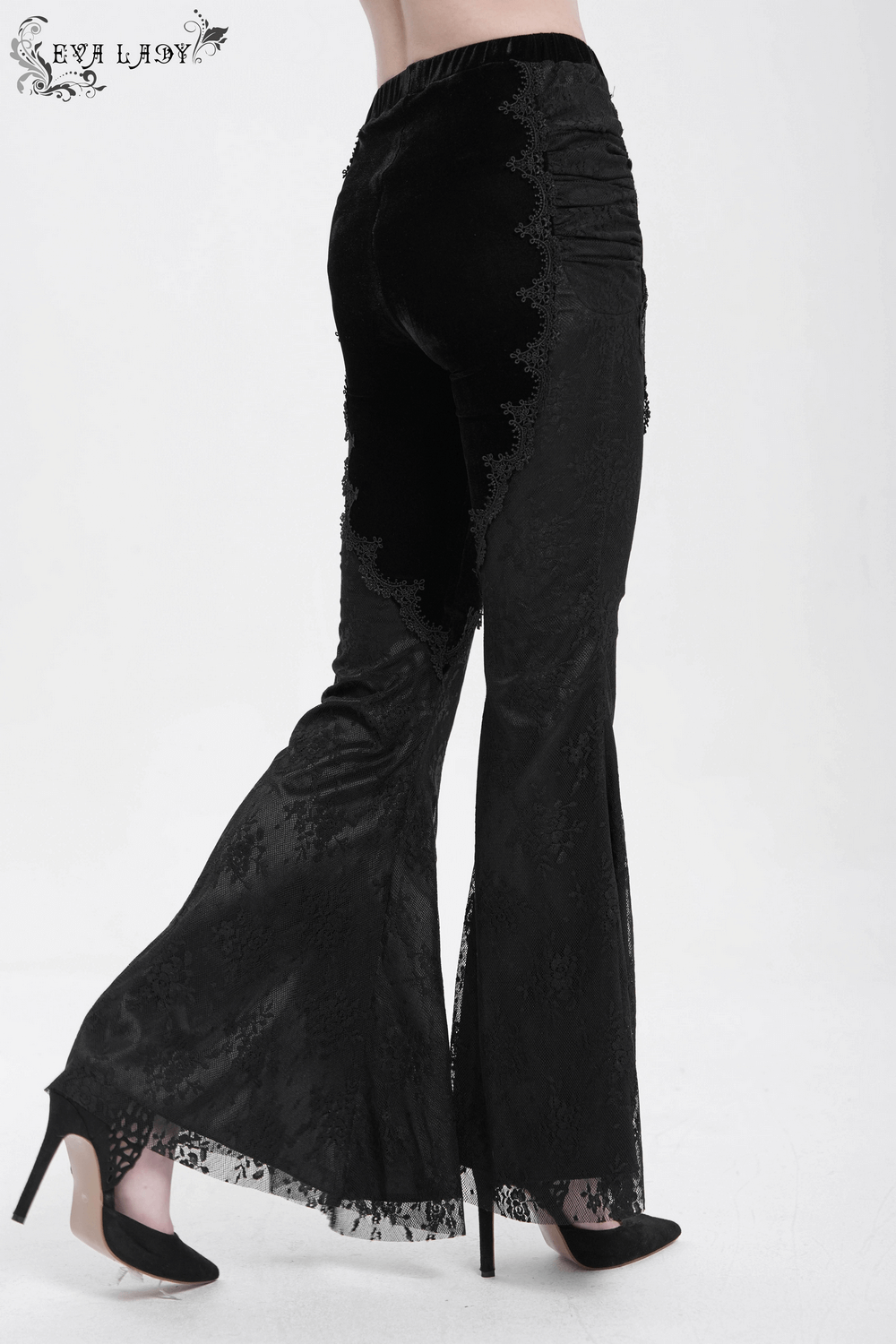 Gothic black velvet and lace flared pants with embroidery, dramatic bell-bottom silhouette and sheer lace hem.