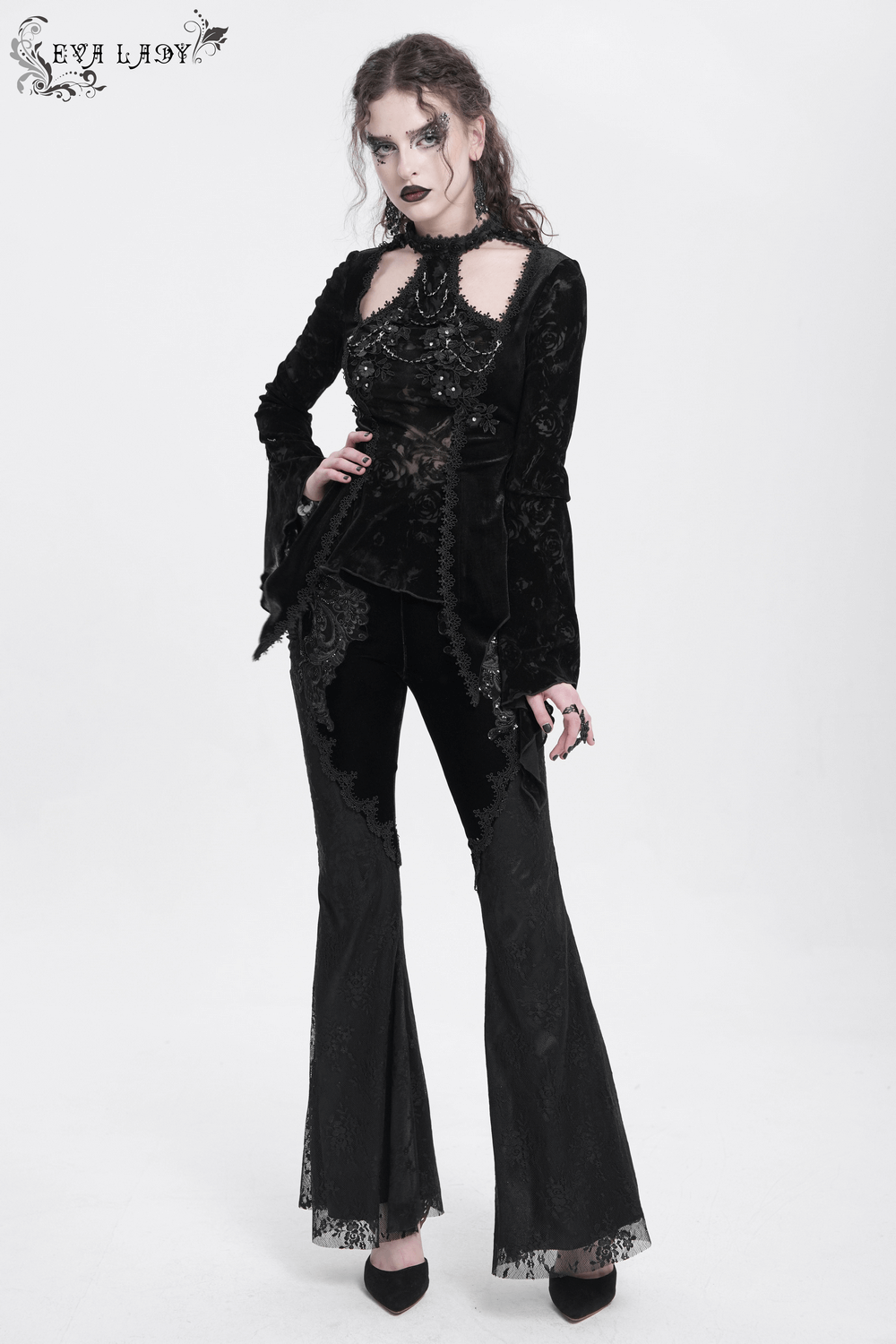 Gothic black velvet and lace flared pants with baroque embroidery, paired with elegant gothic top.