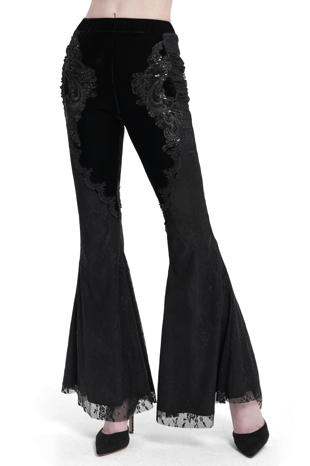 Gothic black velvet and lace flared pants with intricate embroidery and a Victorian-inspired silhouette.