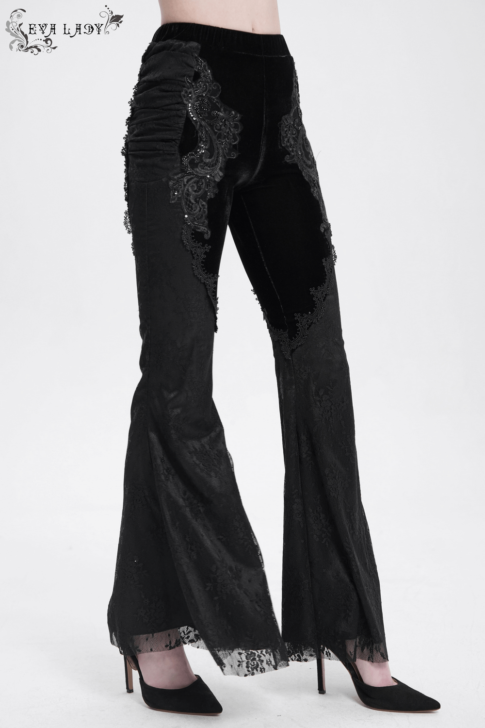 Gothic black velvet flared pants with lace embroidery and bell-bottom silhouette for a romantic Victorian look.