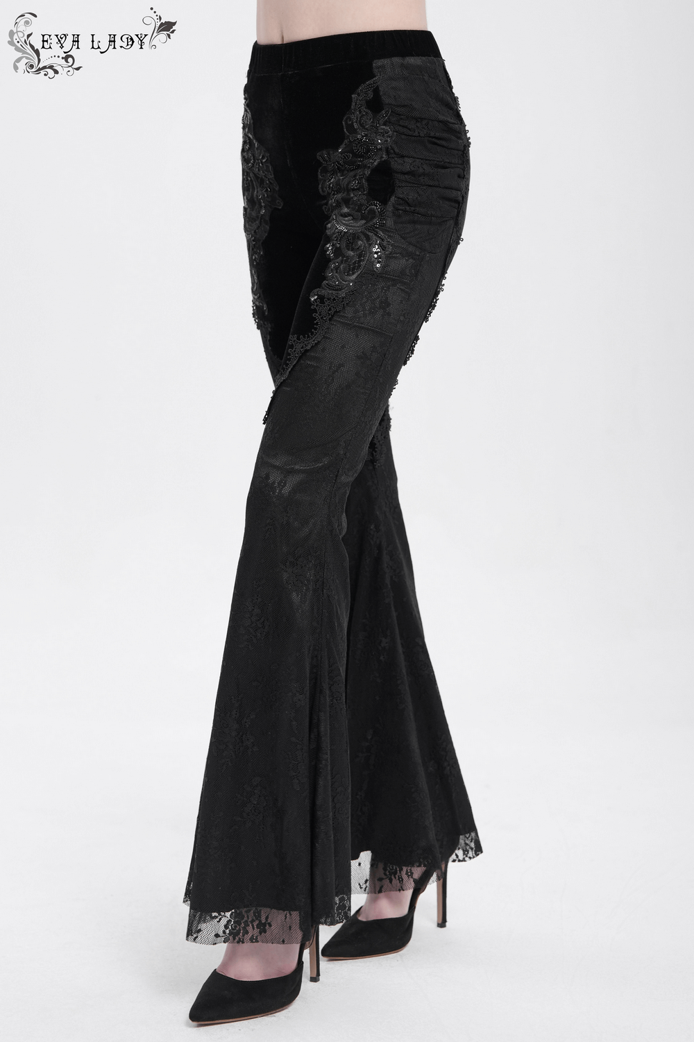 Gothic black velvet flared pants with lace details and embroidery, perfect for a romantic dark aesthetic.