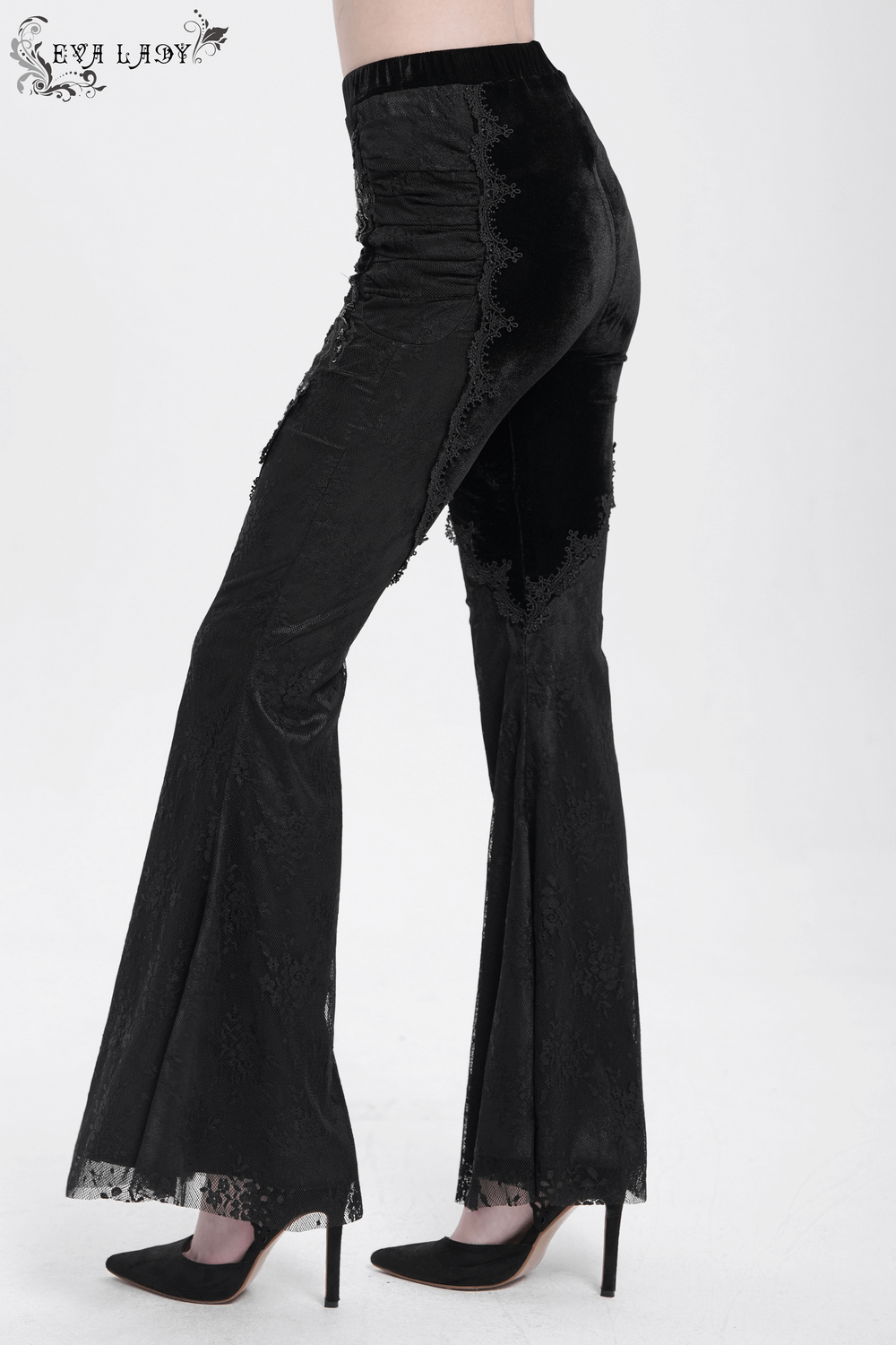 Gothic black velvet and lace flared pants with baroque embroidery details for a Victorian-inspired look.