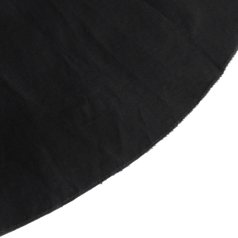 Close-up of black fabric showcasing smooth texture for gothic dress design.