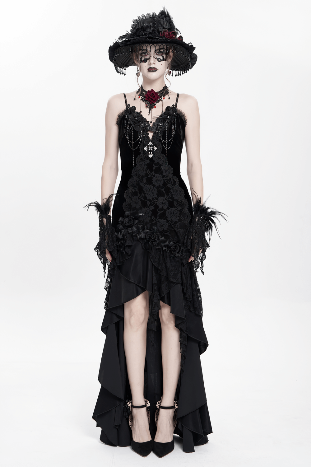 Gothic black velvet and lace high-low evening dress with rose trim and dramatic ruffles, perfect for dark elegance.