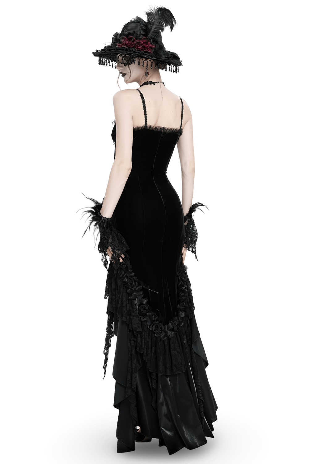 Victorian-inspired gothic black velvet evening dress with lace, ruffles, and elegant hat details.