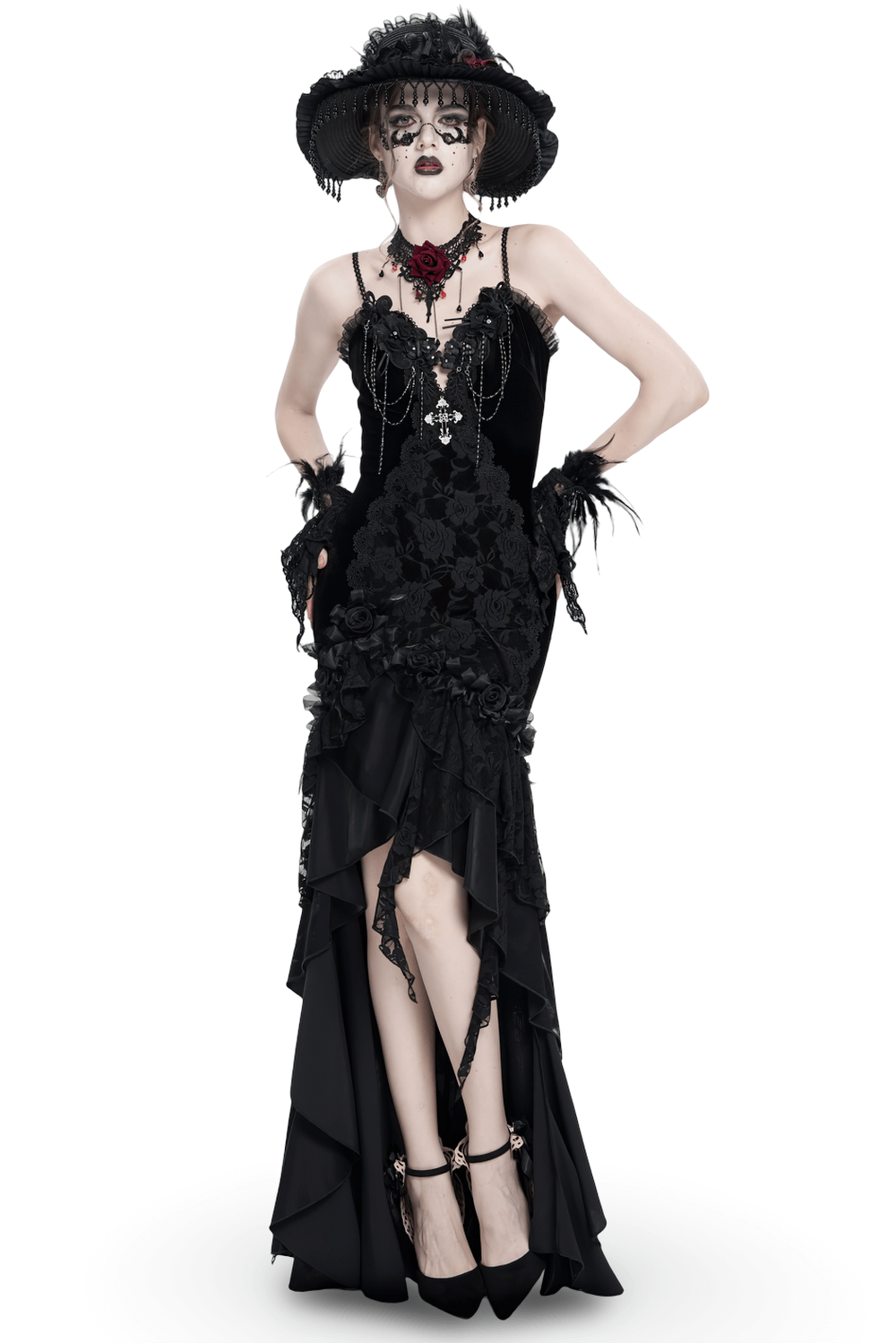 Gothic black velvet evening dress with lace overlay, ruffled hem, and rose trim, exuding dark elegance.