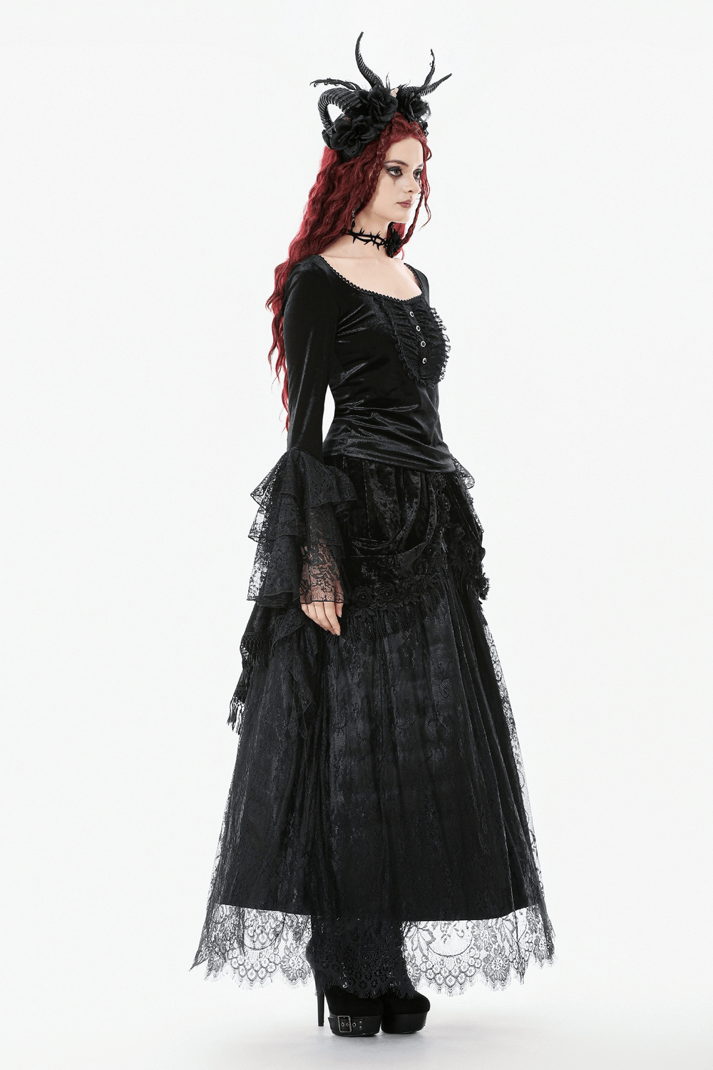 Gothic Black Velvet and Lace Maxi Skirt with Floral Trim worn by a model, showcasing a dramatic layered look.