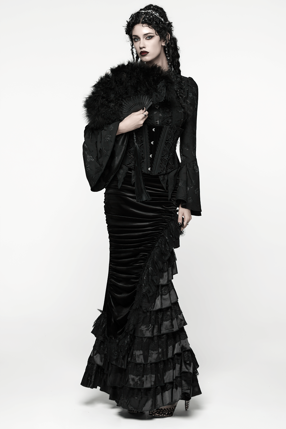 Gothic Black Velvet and Lace Tiered Ruffle Skirt worn by a model showcasing its dramatic layers and elegance.