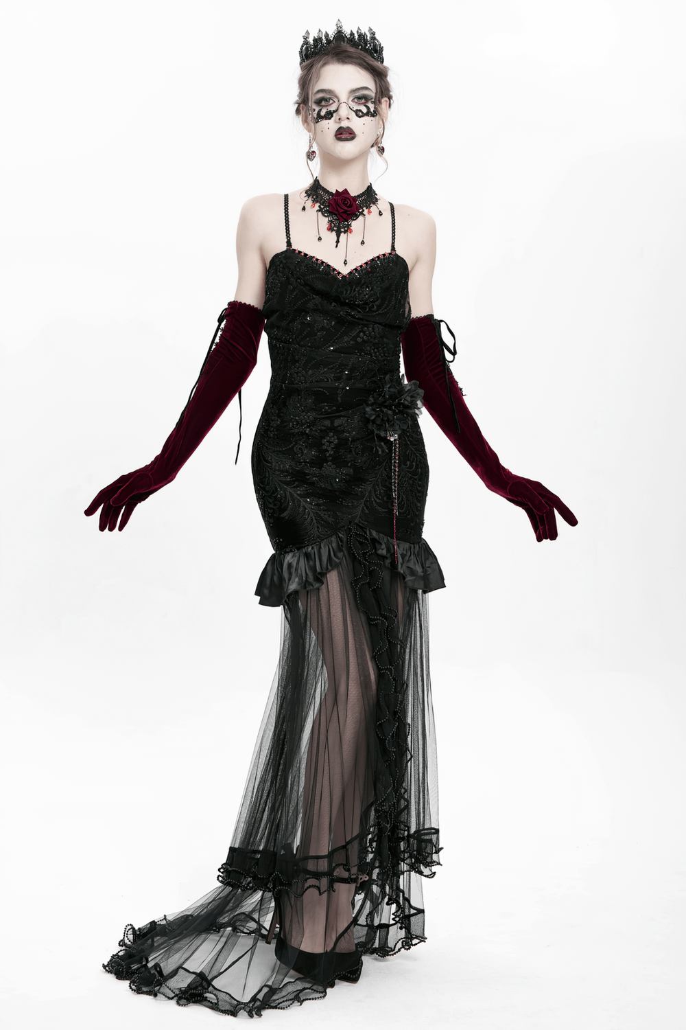 Gothic black velvet and sheer mesh high-low dress with beaded details and elegant ruffles, perfect for evening events.