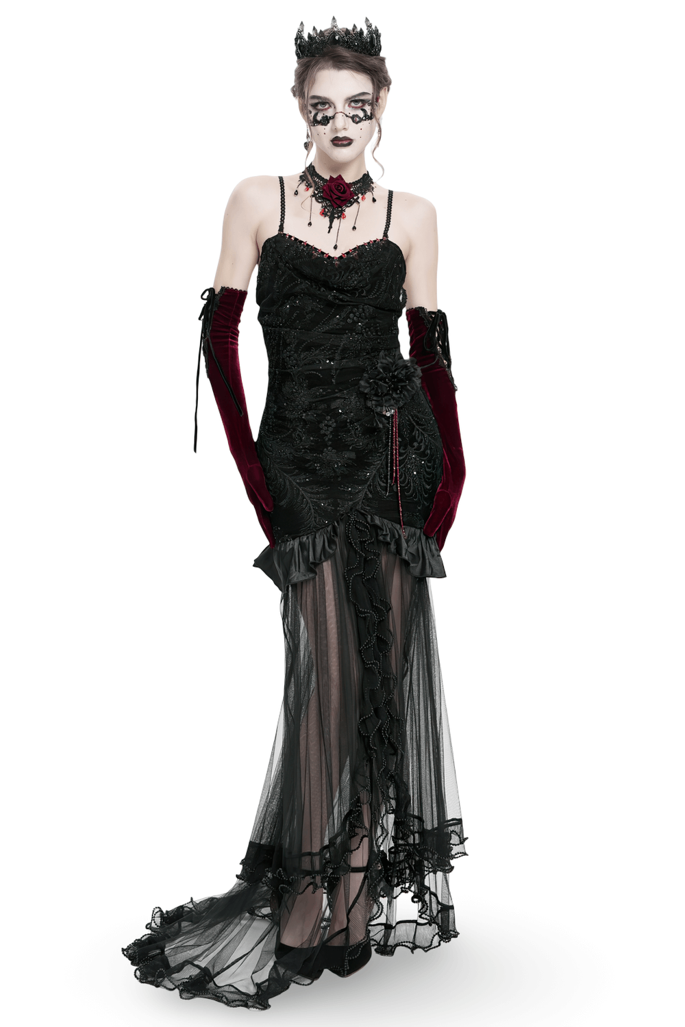 Gothic black velvet and sheer mesh high-low dress with intricate embroidery and dramatic train.