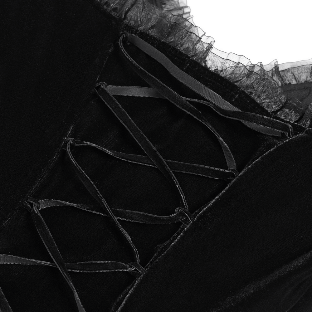 Close-up of corset back with lace detailing on gothic black velvet dress, showcasing intricate lacing and elegant design.