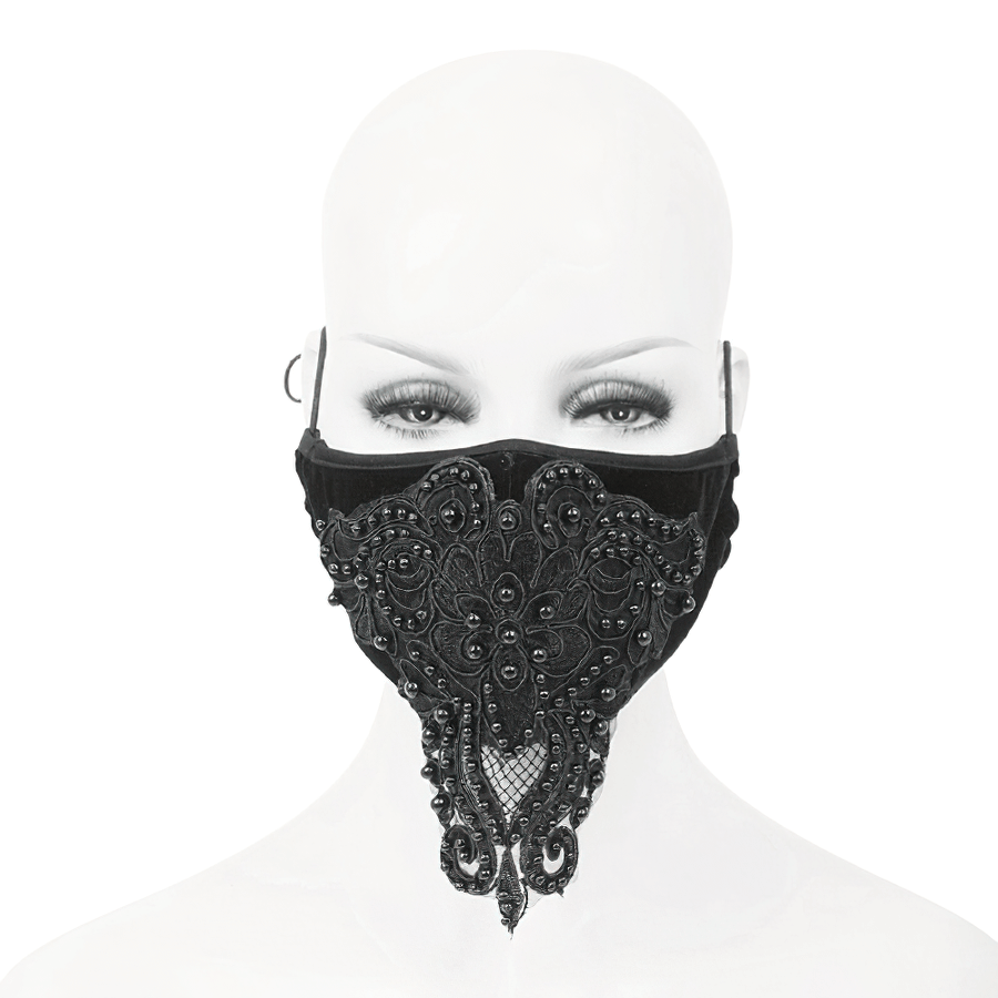 Stylish gothic black velvet face mask with lace appliqué and adjustable straps, perfect for a chic accessory.