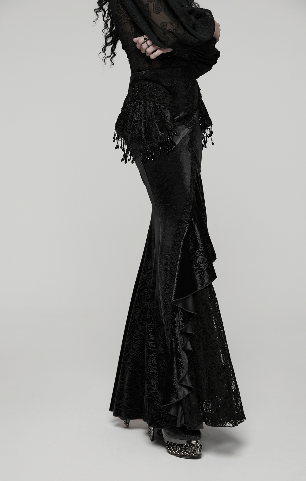 Gothic Black Velvet Fishtail Skirt with Lace Detail showcasing luxurious velvet and lace design with tassel accents.