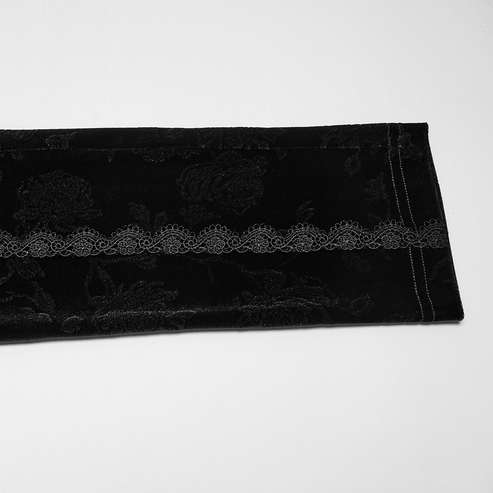 Gothic Black Floral Jacquard Lace Up Leggings close-up of intricate floral pattern and lace details.