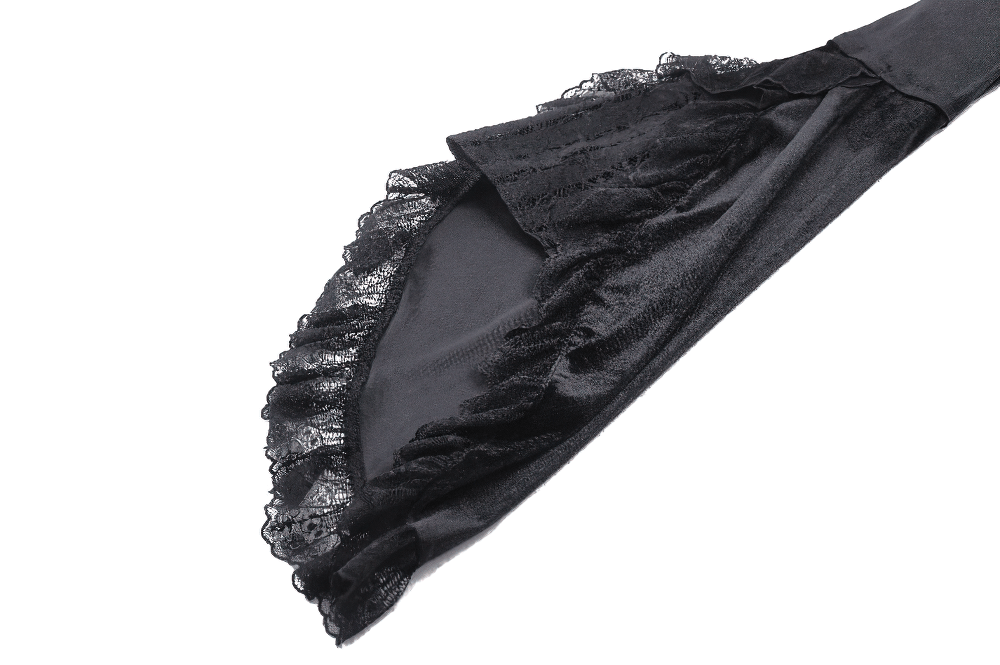 Elegant black lace bell sleeve detail of a gothic velvet dress, showcasing intricate design and luxurious fabric.