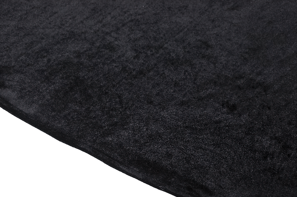 Close-up of luxurious black velvet fabric, perfect for creating elegant gothic clothing or accessories.