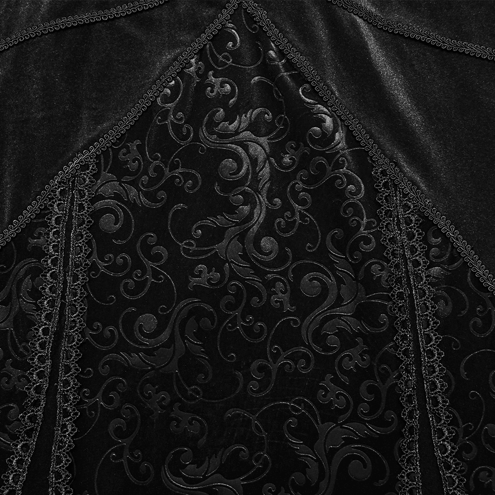 Elegant black velvet fabric with intricate embossed floral patterns and lace detailing for gothic dress design.
