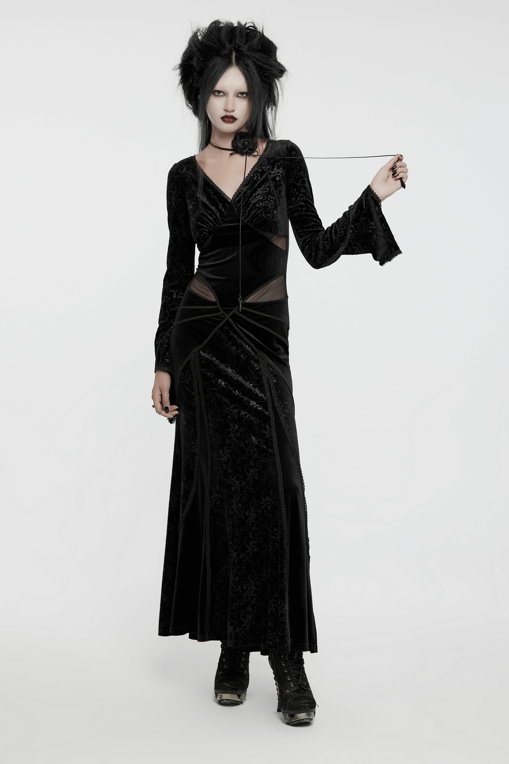 Elegant gothic black velvet long dress with mesh splicing and embossed details for a striking look.