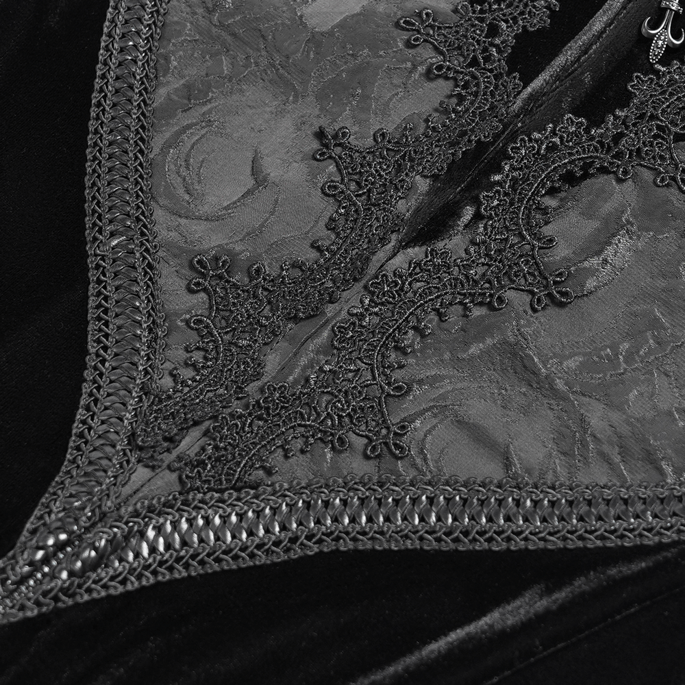 Close-up of lace detailing and zipper on Gothic black velvet long dress, showcasing intricate embroidery and elegant design.