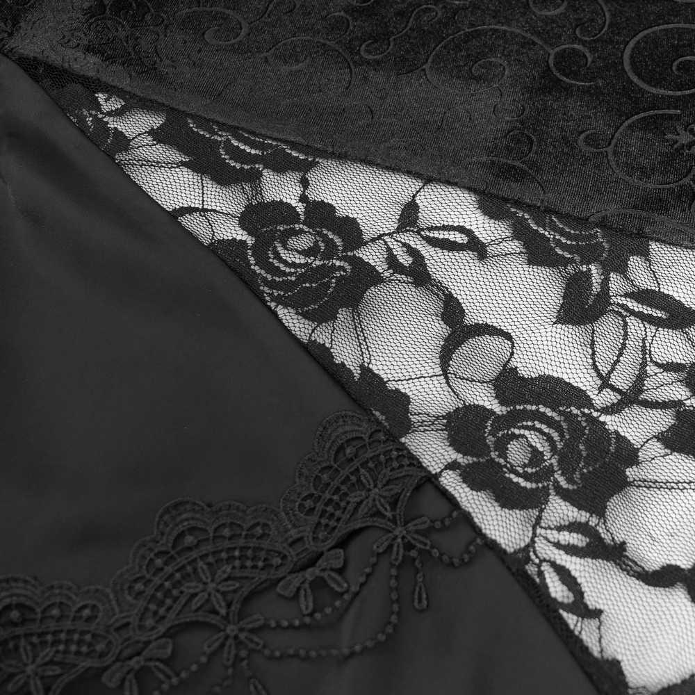 Close-up of black velvet and lace fabric showing floral details and elegant textures, perfect for a gothic maxi skirt.