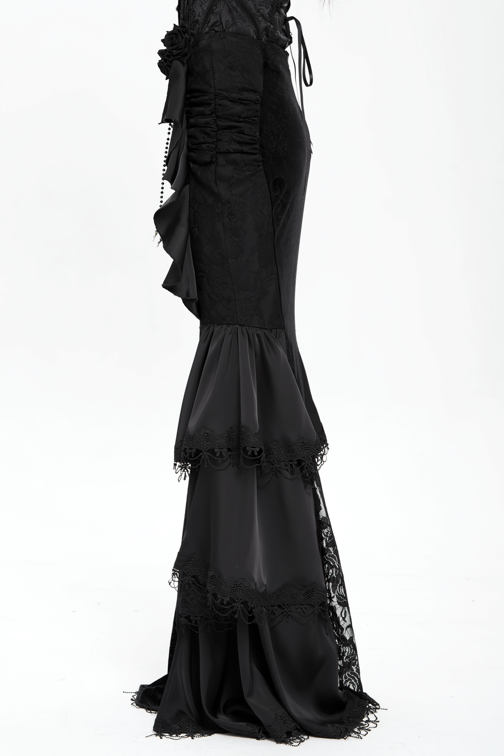 Elegant Gothic black velvet maxi skirt with cascading ruffles and lace trim, showcasing a dramatic silhouette.