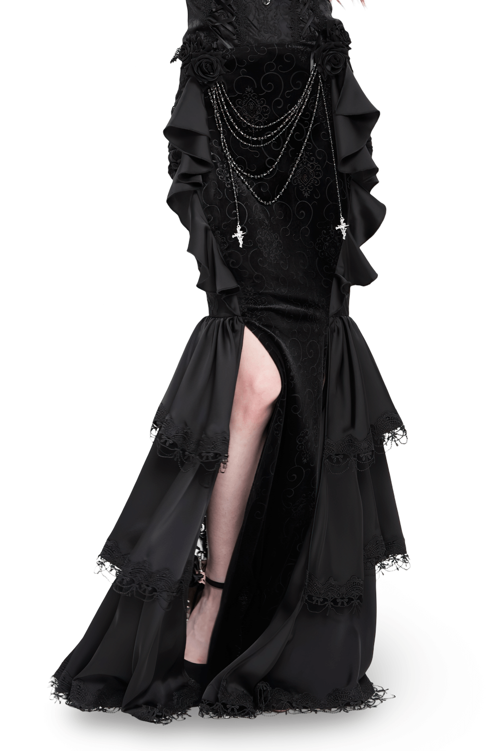 Gothic black velvet maxi skirt with ruffles, lace trim, and chains, featuring high side slit and floral accents.