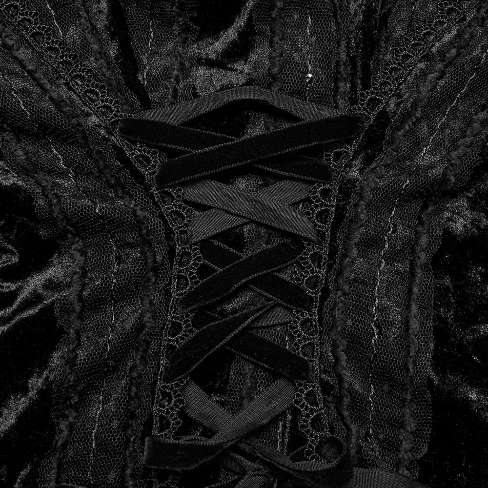 Close-up of gothic black velvet shirt's lacing, showcasing intricate lace details and luxurious texture.