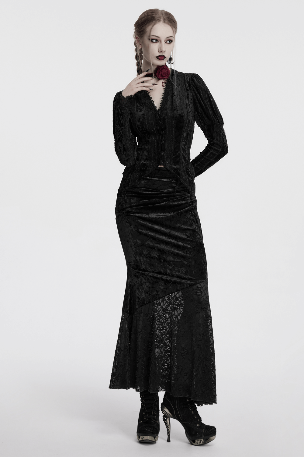 Gothic black velvet shirt with gigot sleeves, lace detailing, and captivating silhouette for a dramatic look.
