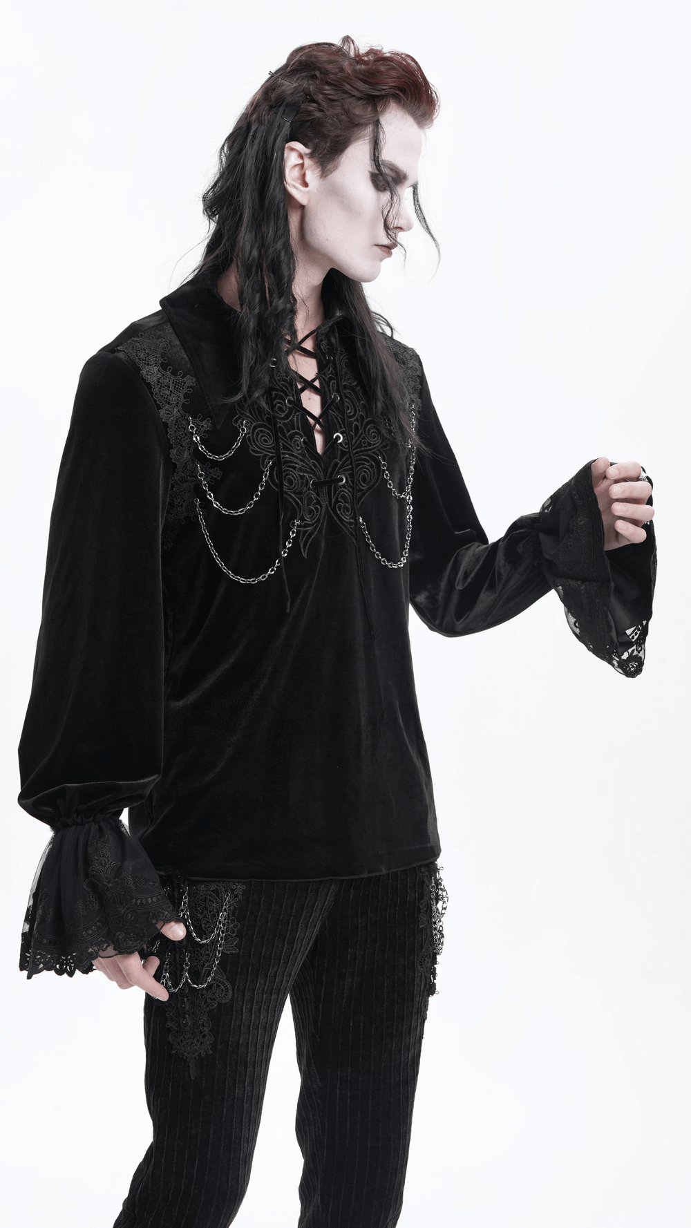 Gothic black velvet shirt with lace and chain details, featuring long sleeves and a unique lace-up design.