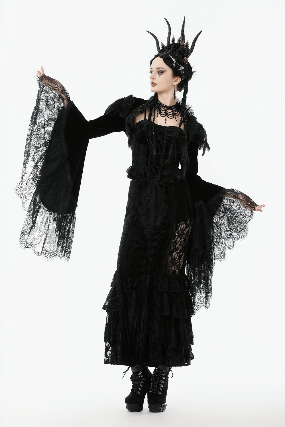 Gothic Black Velvet Shrug with Lace and Feather Trim paired with elegant black dress and accessories.