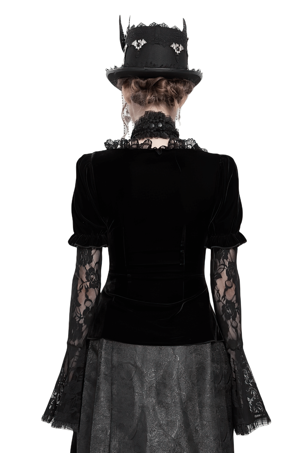 Back view of a gothic black velvet top with lace bell sleeves, paired with a stylish hat and ruffled collar.