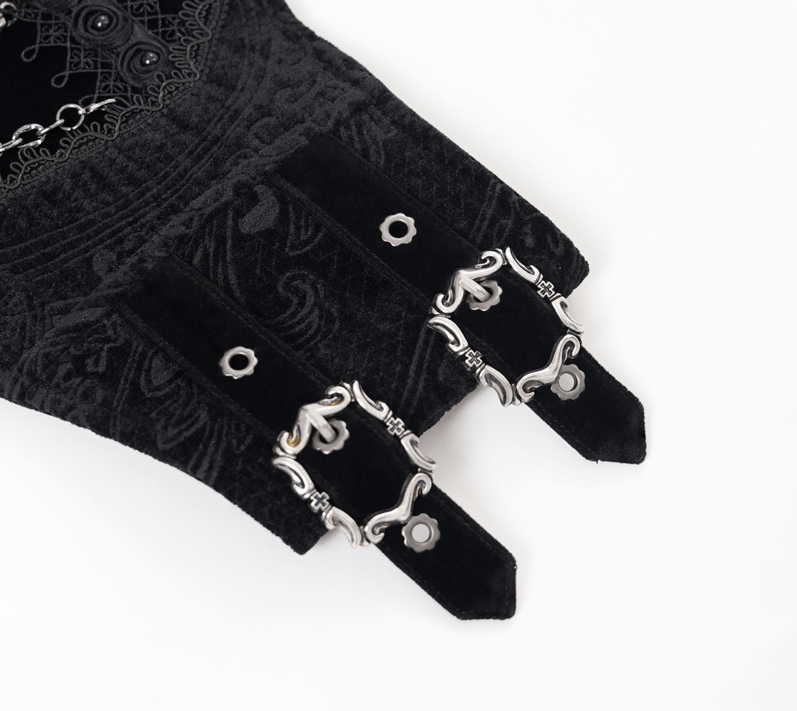 Detailed view of the gothic black waist cincher with ornate silver buckles and intricate paisley patterns.