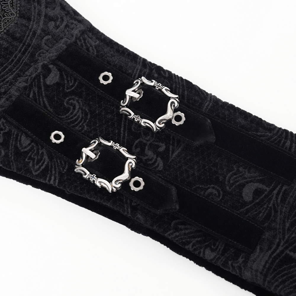 Close-up of a gothic black waist cincher with intricate paisley patterns and elegant silver buckles.