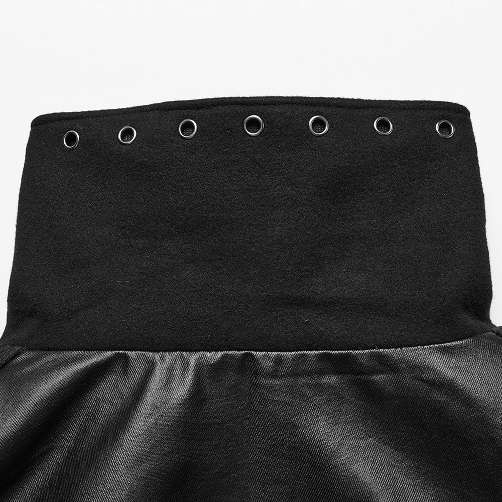 Close-up of the high-stand collar on a gothic black woolen cape with grommet accents and dramatic fabric texture.