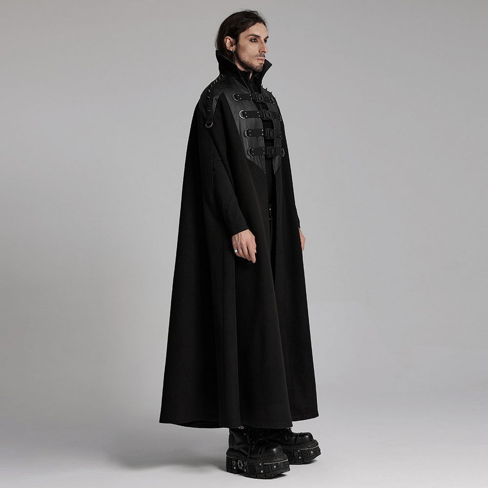 Gothic black woolen cape with bold buckles and stand collar worn by a model, perfect for punk style enthusiasts.