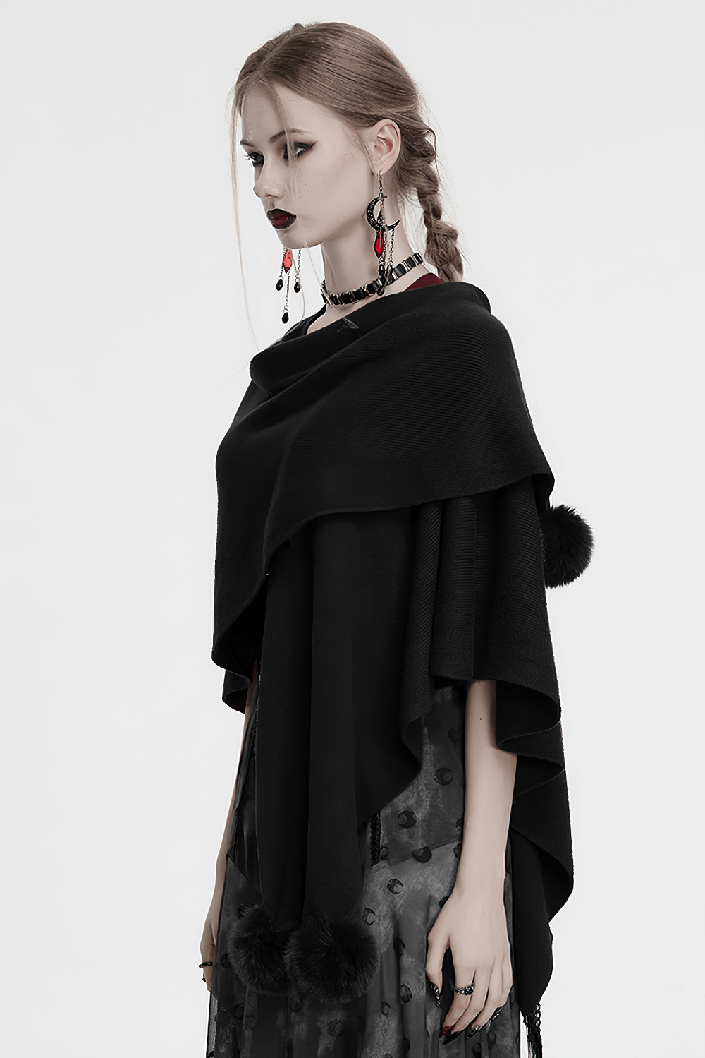 Gothic black woolen shawl with lunar eclipse print and fur ball trim, showcasing witchy elegance and celestial vibes.