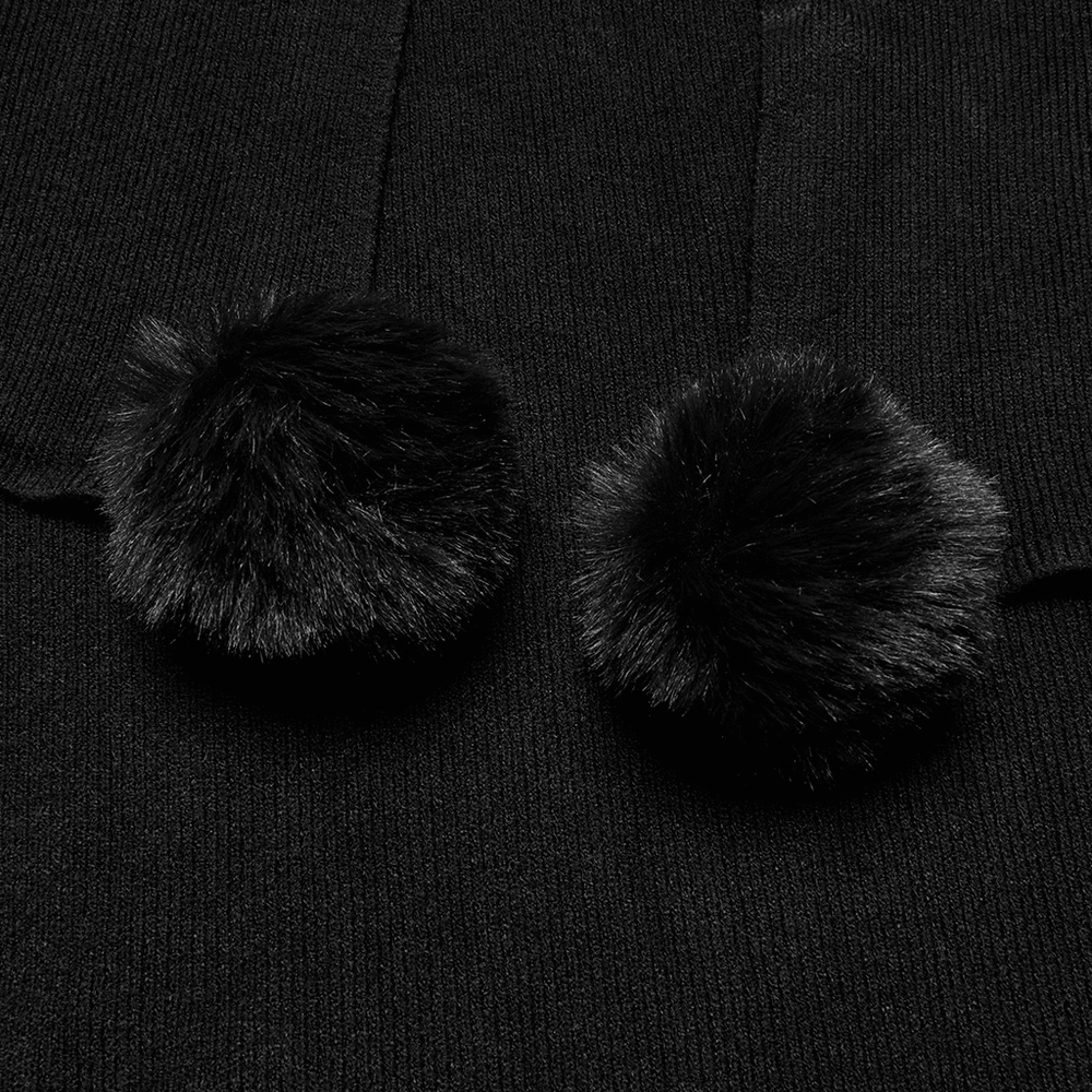 Close-up of black fur ball trims on a Gothic shawl, adding elegance to the lunar eclipse print.