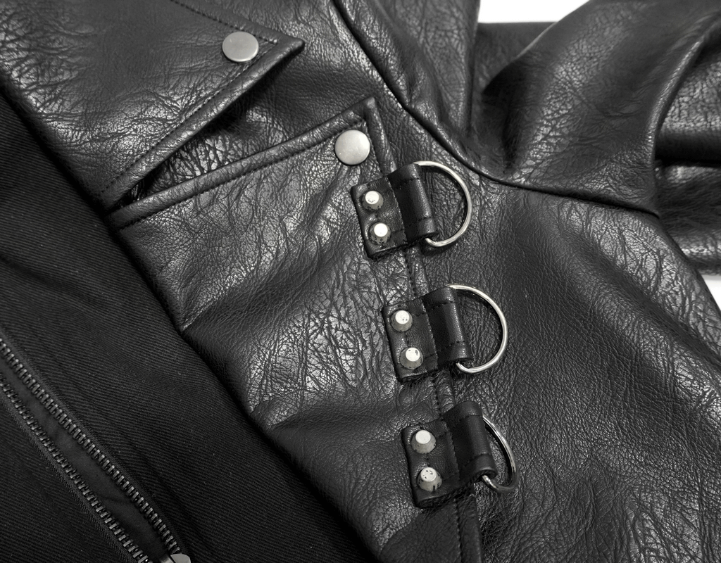 Close-up of Gothic black leather coat featuring studs and D-rings, showcasing premium PU leather texture.