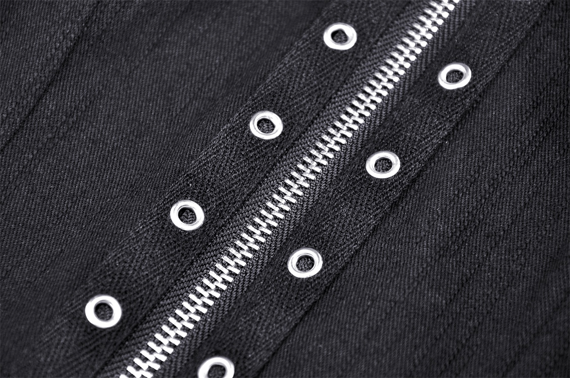 Close-up of black zipper detail and metal accents on gothic mesh top for an edgy fashion look.