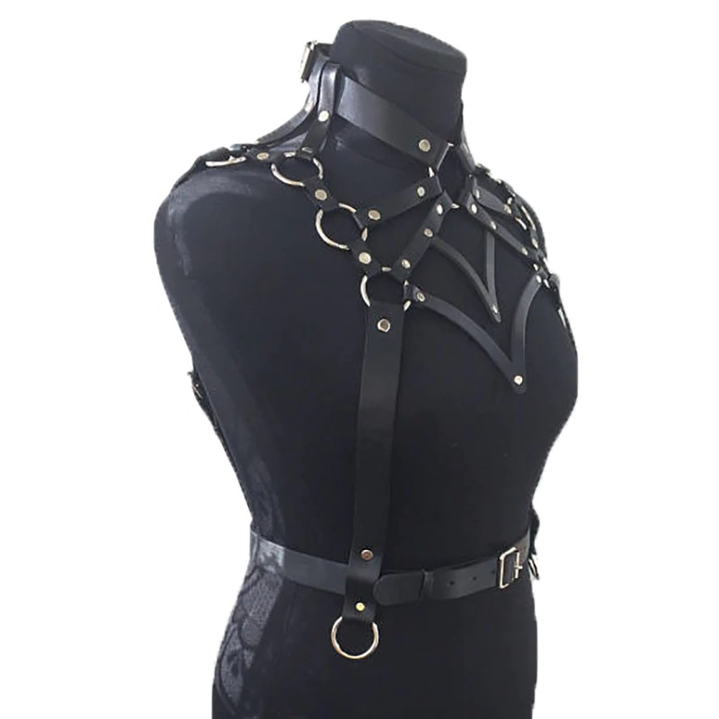 Black Gothic body harness for women, made of synthetic leather, showcasing edgy design and bold style.
